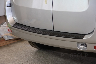 Накладка на задний бампер (ABS, черное тиснение) на LADA Largus с 2012 на автомобиль от Интернет-Магазина Autoboks.kz